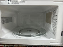 Mainstays 0.7 Cu ft Countertop Microwave Oven, 700 Watts, Black!! LIGHTLY USED, MINOR SCRATCH & DENT!!