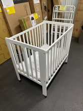Delta Children Lee Portable Folding Mini Crib with 1.5-Inch Mattress - Greenguard Gold Certified, Bianca White- new