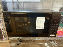 Mainstays 2.2 cu ft Microwave Ovens in Black!! NEW OUT OF BOX(SCRATCHED FROM SHIPPING, TESTED WORKS FINE)!!