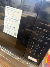 Mainstays 2.2 cu ft Microwave Ovens in Black!! NEW OUT OF BOX(SCRATCHED FROM SHIPPING, TESTED WORKS FINE)!!