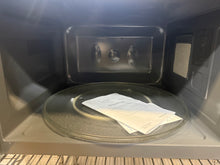 Mainstays 2.2 cu ft Microwave Ovens in Black!! NEW OUT OF BOX(SCRATCHED FROM SHIPPING, TESTED WORKS FINE)!!