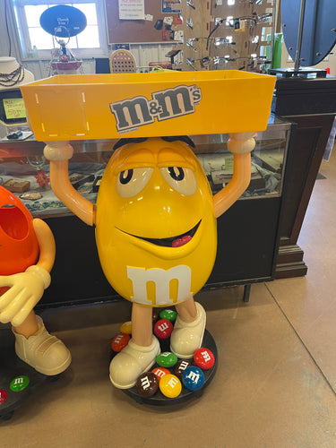 M&M Yellow Character Candy Store Display w/ Storage Tray 

Rolling Wheels

(47” tall) 

used condition