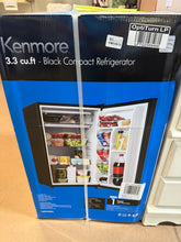 3.3 cubic foot Kenmore mini refrigerator is a great storage option for extra beverages , perishables or snacks- new in box- might have scratch or dents
