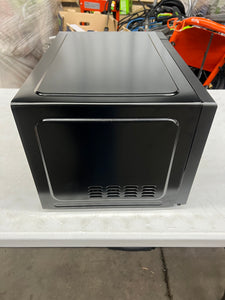 Mainstays 1.1 Cu ft Microwave Oven, Black!! NEW OUT OF BOX(MINOR DENT FROM SHIPPING)!!