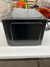 Mainstays 1.1 Cu ft Microwave Oven, Black!! NEW OUT OF BOX(MINOR DENT FROM SHIPPING)!!