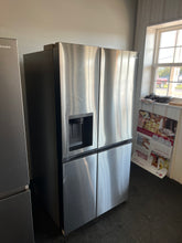 LG Door in Door 27.2 cu. ft. Side-by-Side Refrigerator with Ice Maker!! BRAND NEW(MINOR DENT ON FRONT DOOR FROM SHIPPING)!!