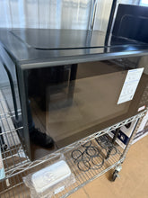 Mainstays 2.2 cu ft Microwave Ovens in Black!! - USED - (SCRATCHED FROM SHIPPING, TESTED WORKS FINE)!!