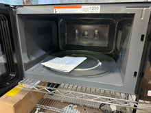 Mainstays 2.2 cu ft Microwave Ovens in Black!! - USED - (SCRATCHED FROM SHIPPING, TESTED WORKS FINE)!!