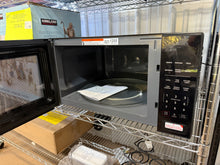Mainstays 2.2 cu ft Microwave Ovens in Black!! - USED - (SCRATCHED FROM SHIPPING, TESTED WORKS FINE)!!