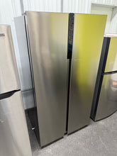 Frigidaire 21.4-cu ft Counter-Depth Side-by-Side Refrigerator ( Fingerprint-Resistant Stainless Look )!! BRAND NEW (MINOR TAPE RESIDUE ON DOOR & MINOR DENTS)!!