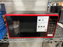 Mainstays 0.7 Cu ft Capacity Countertop Microwave Oven, Red
