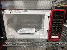 Mainstays 0.7 Cu ft Capacity Countertop Microwave Oven, Red