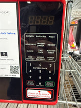 Mainstays 0.7 Cu ft Capacity Countertop Microwave Oven, Red