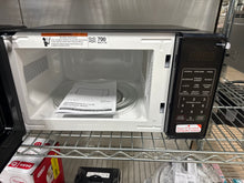 Mainstays 0.7 Cu ft Countertop Microwave Oven, 700 Watts, Black