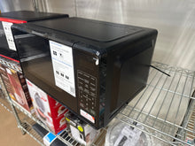 Mainstays 0.7 Cu ft Countertop Microwave Oven, 700 Watts, Black