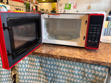 Mainstays 0.7 Cu ft Capacity Countertop Microwave Oven, Red! (NEW OUT OF BOX)