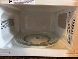 Mainstays 0.7 Cu ft Capacity Countertop Microwave Oven, Red! (NEW OUT OF BOX)